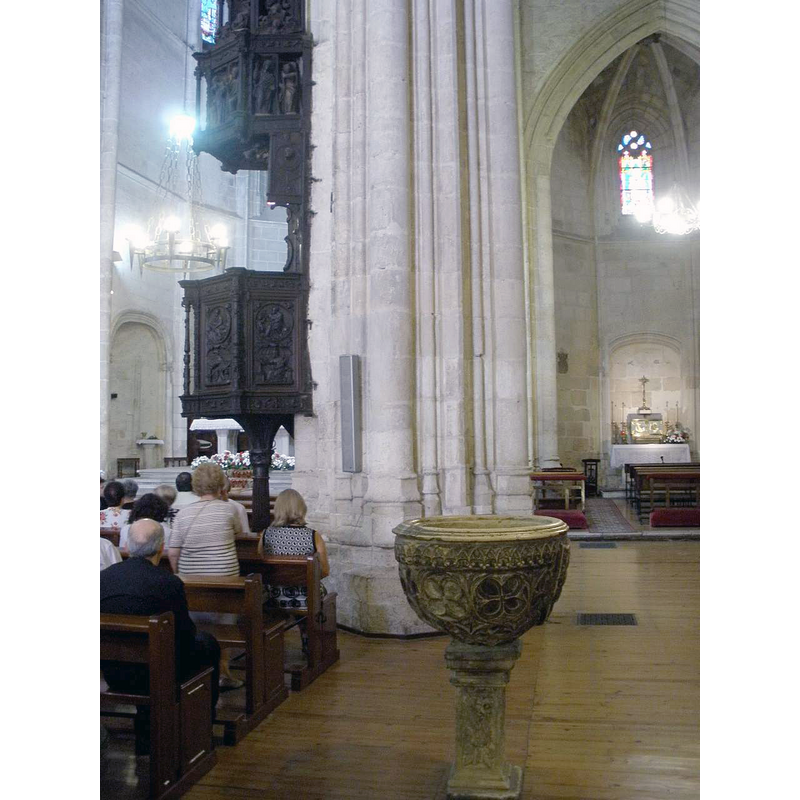 one of several interesting holy-water stoups in this church