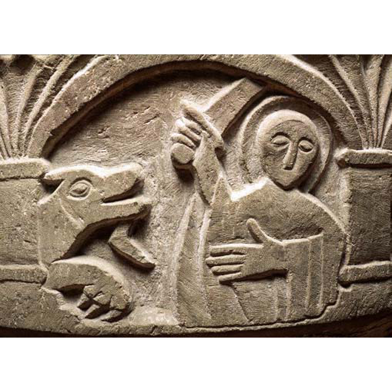the saint is haloed and has a raised sword in his right hand while the left lays across his middle
