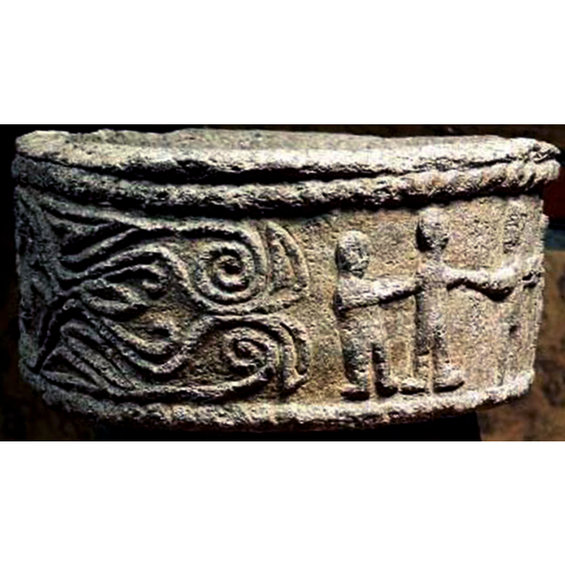 the complex vine on the left, the Crucifixion scene on the right