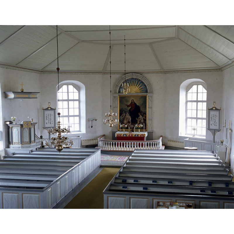 interior of the 19thC church; the top of the medieval font is partially visible at the far [east] end, right [south] side