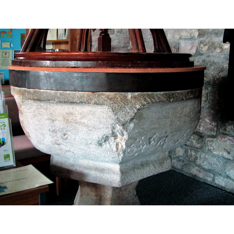 the basin was probably totally round originally but appears to have been re-cut; the polyconal end of the basin underbowl is incongruous; the metal cinch was added to reinforce a cracked basin