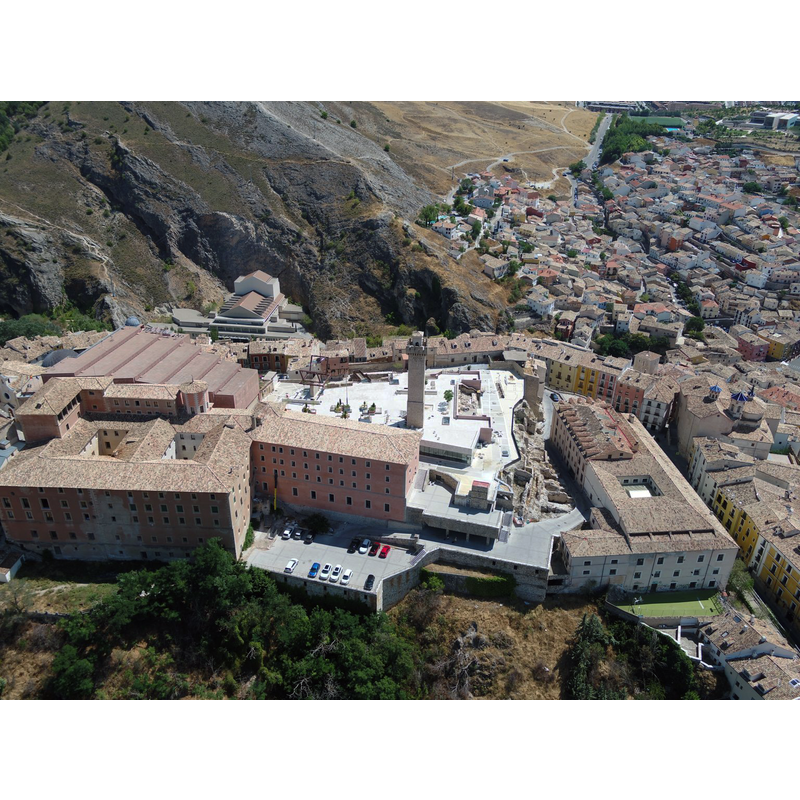 view of the Plaza de Mangana in context. The archaeological site near the tower contains the remains of the Iglesia de Santa Maria de Gracia, formerly a medieval synagogue; it was converted for use as a Christian church in 1403.