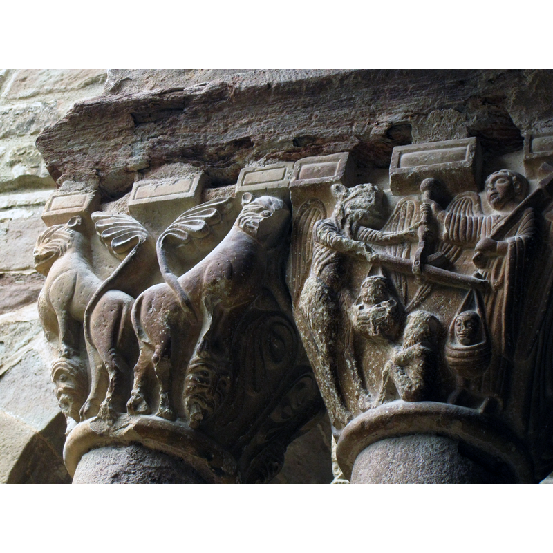 lions with human heads on the left -- Weighing of the souls on the right