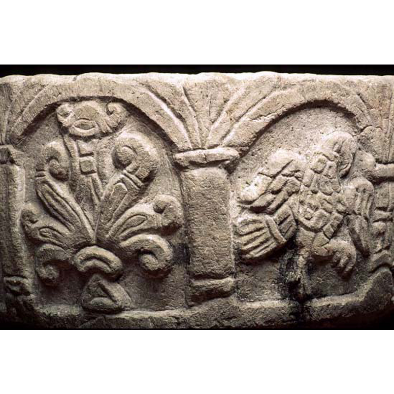 busily patterned body and plumage; passant to the right; probably an eagle
