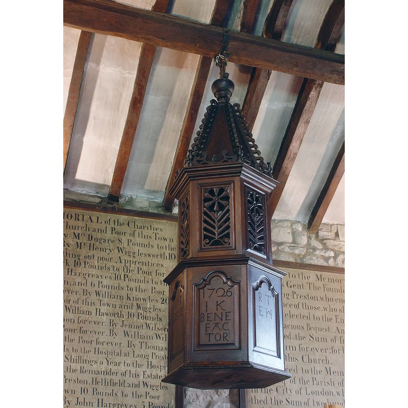 Source caption: "The Font Canopy at St Mary's Church [...] bears the date 1726, and the initials of the churchwardens at the time."