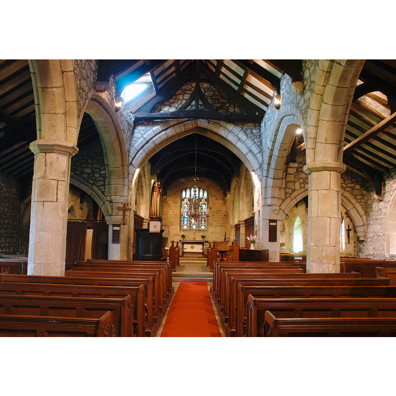 Source caption: "The Nave and Chancel at St Mary's Church. The present church dates from the late 14th or early 15th century. Note the leaning columns on the right hand side of the nave!"