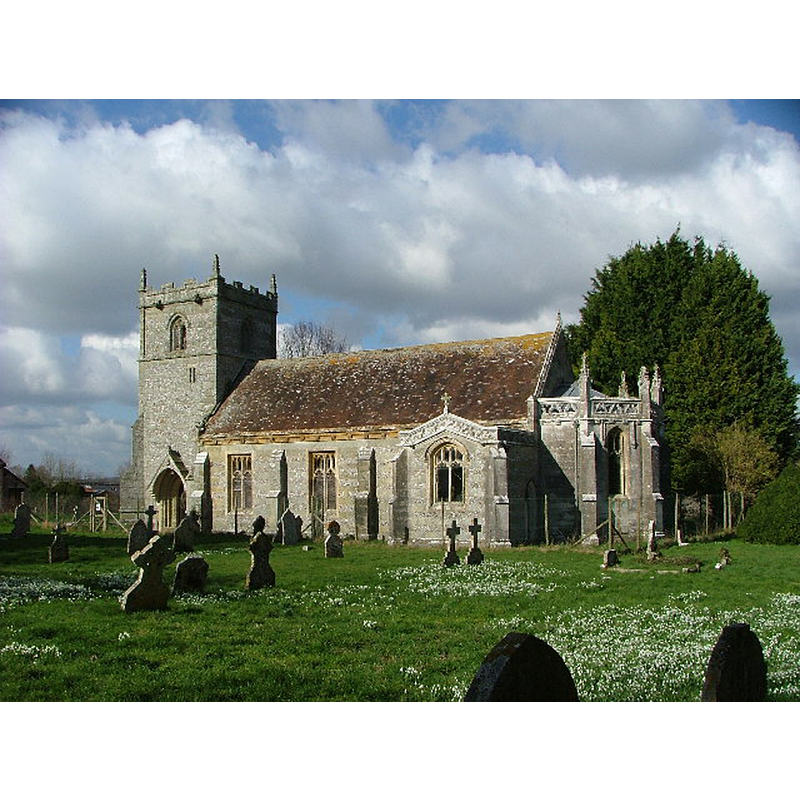 Source caption: "St Mary's Church, Long Crichel, Dorset. This little flint and limestone church was closed in 2003 and is now surrounded by a fence."
