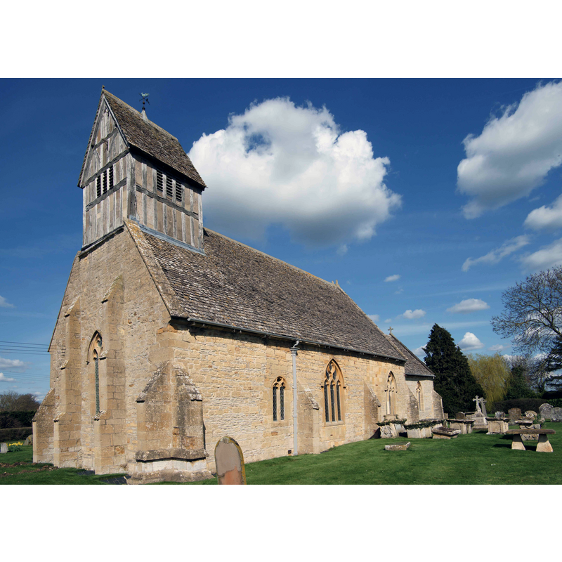 Source caption: "St James The Great Church in Long Marston, showing its unusual timber framed bell tower."