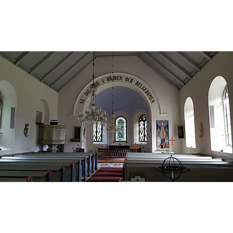 the top of the medieval font is partly visible on the right [south] side, far [east] end