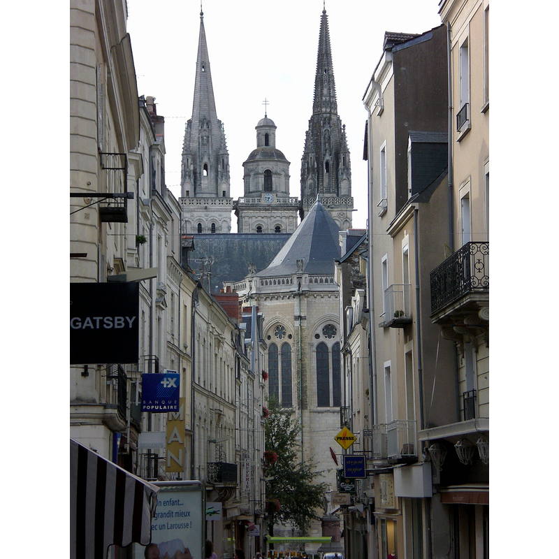 Source caption: " "Rue Saint-Aubin", a street in Angers downtown, Maine-et-Loire, France. The back of Saint Maurice cathedral is in the background."