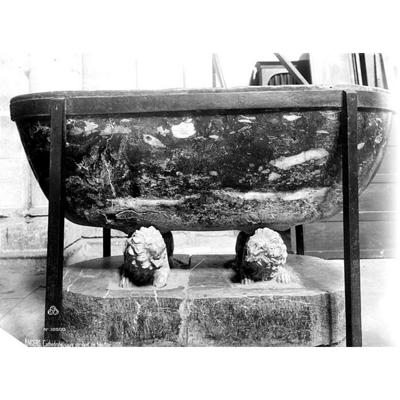 between the basin and the larger volume of the base