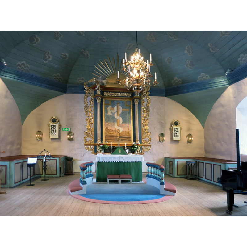 there are two modern fonts in the background, right and left of the altar; both modern and both on casters