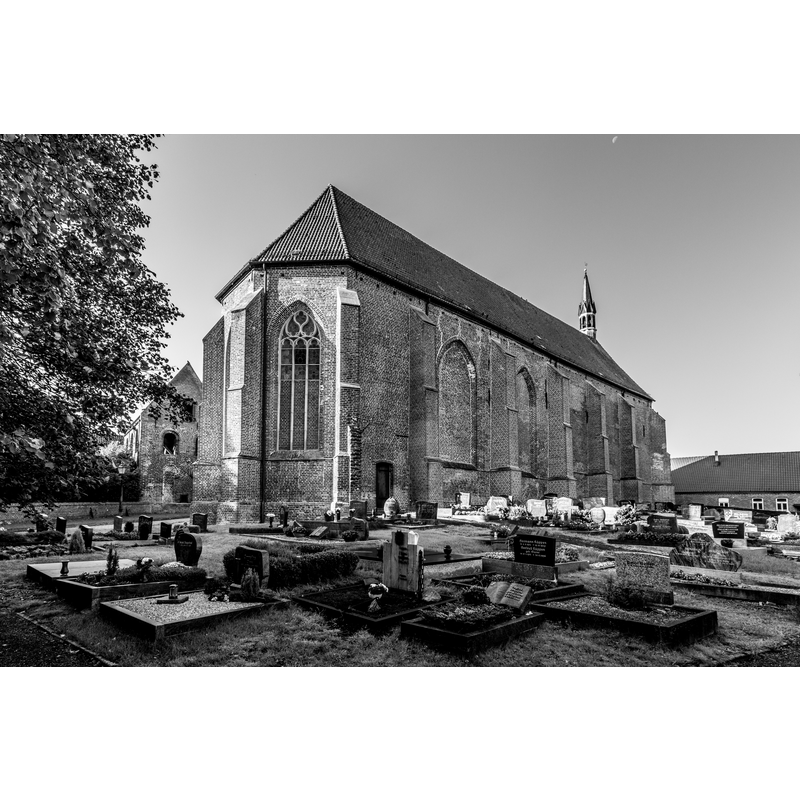 some sections of the north and east walls are said to have been re-sued from the earlier church here