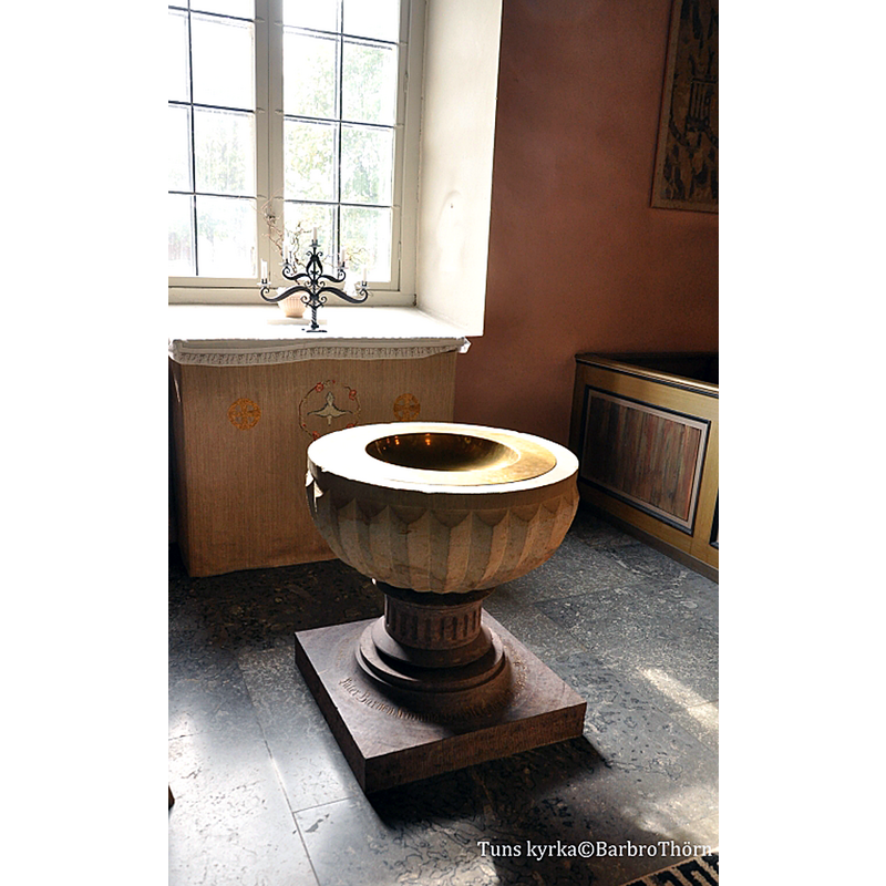 the modern font at the southeast corner of the nave
