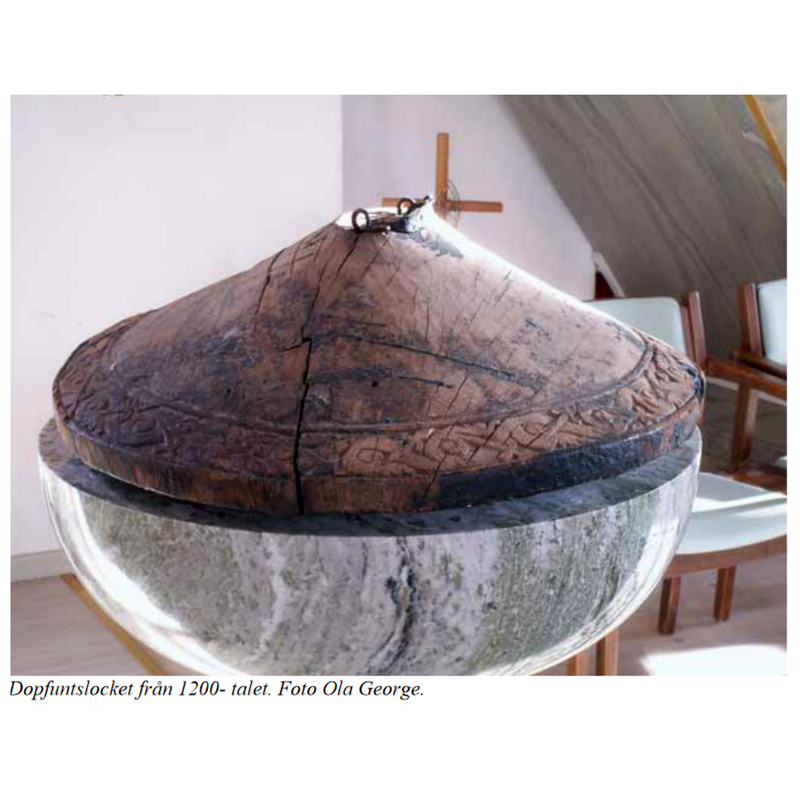 the basin on which the old font cvoer stands is probably the modern font in Tuna kyrka