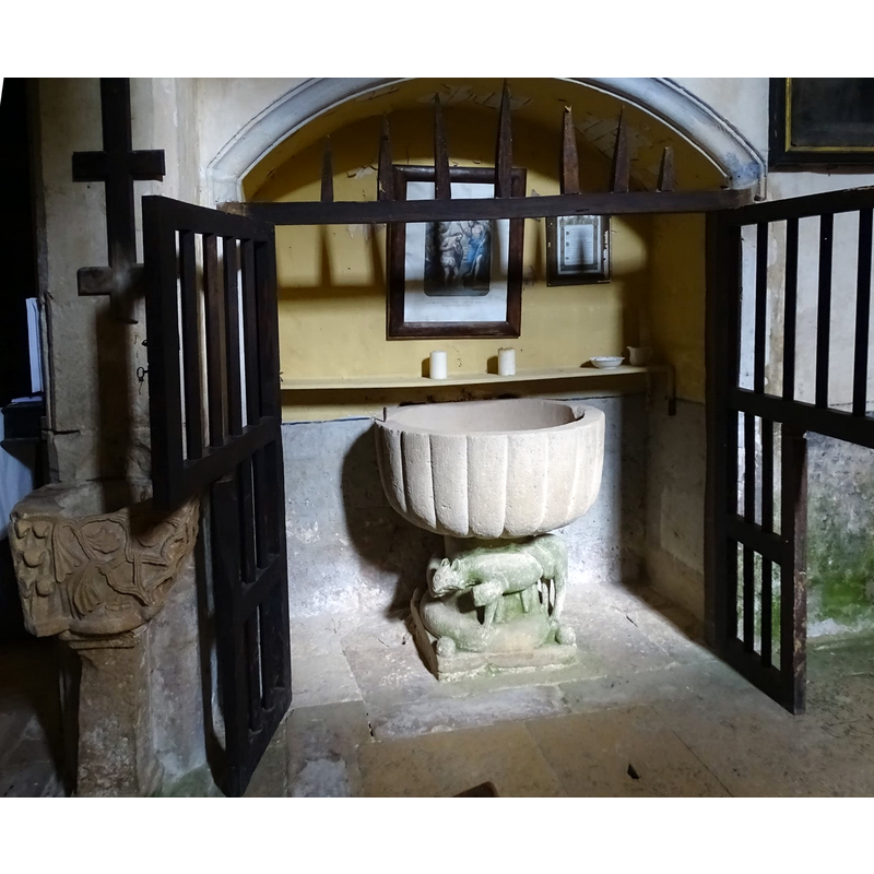 notice the medieval stoup outside the baptistery, on the left