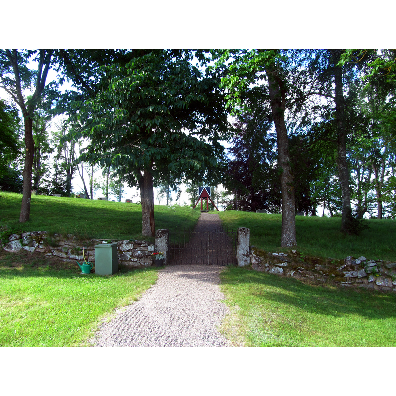 Source caption: "Ottravads gamla kyrkplats" -- the wooden 1872 belfry and some graves remain on the site of the demolished old church at Ottravad; materials from the medieval church were re-used in the construction of the Dimbo-Ottravad parish church that replaced both earlier parish churches