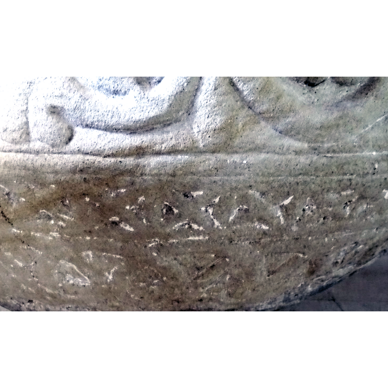 as seen here, the motifs are very worn and resemble a large flat X on its side in a square, but they could have originally been dog-tooh, nail-head or saltires inside squares