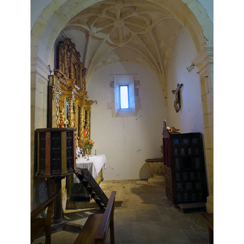 the font and cover are partially visible in the right corner, behind the confessional