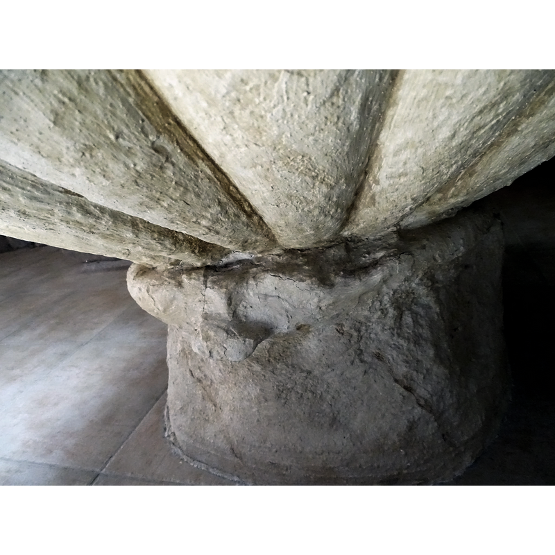this area retains the ribbed pattern that may have covered the whole exterior of the basin originally