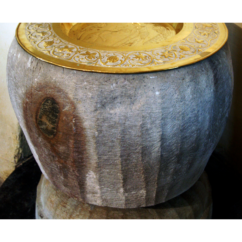 the coloration of the stone occurred probably naturally, a chemical reaction within the composition of the stone itself