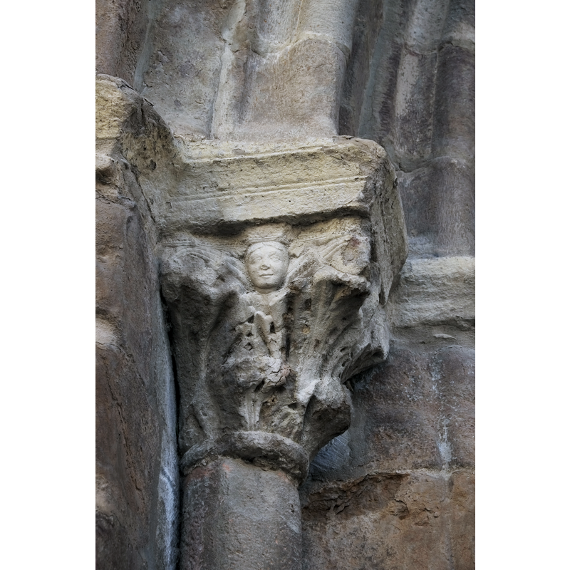 capital on the third column counting from the door
