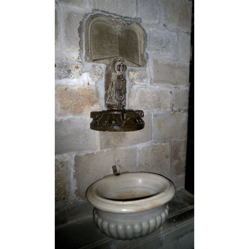 one of the stoups in the interior of the church
