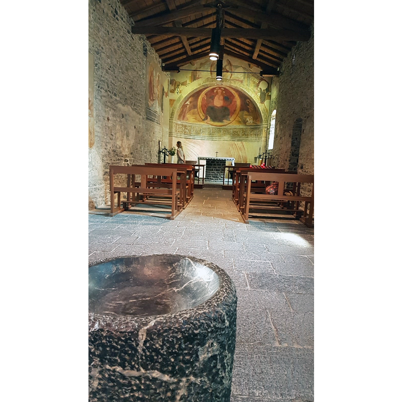 with the holy-water stoup in the foreground