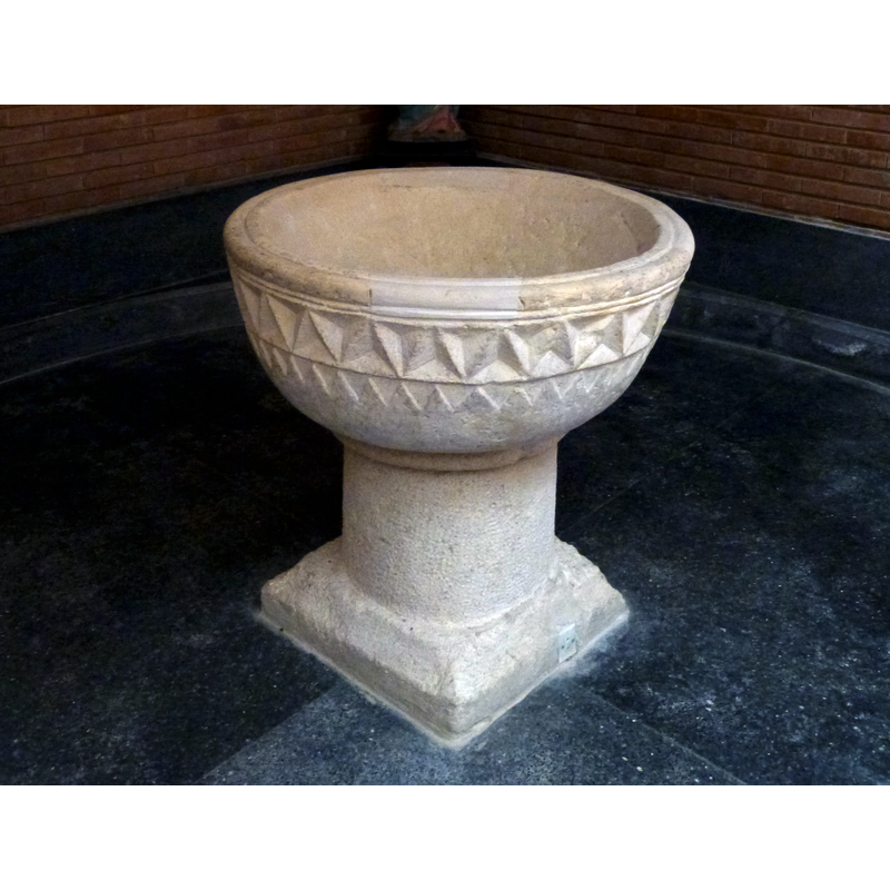 the late-medieval(?) font in the 1950s church that replaced the earlier one