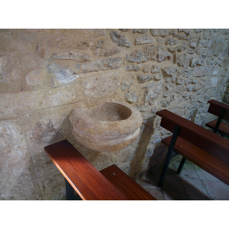 mounted on the south wall, just west of the south entranceway