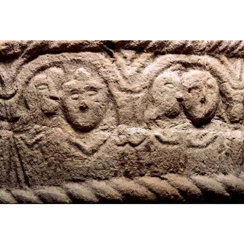in both cases the figure on the right is larger, with a full round face whereas the figure or head on the left is smaller and almost bird-like