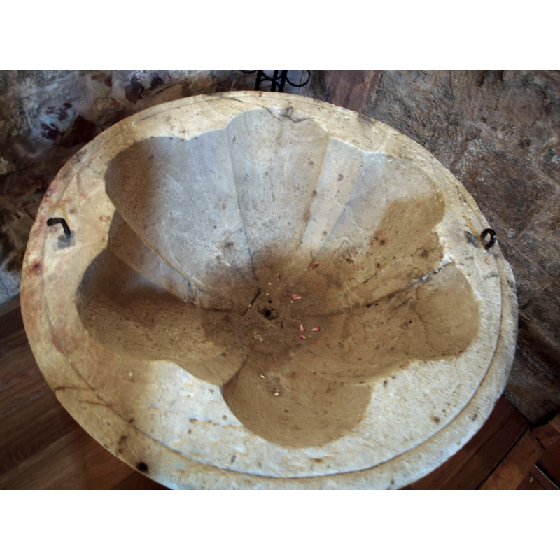 notice the metal stapkes in the upper rim, the several spots of damage to the basin