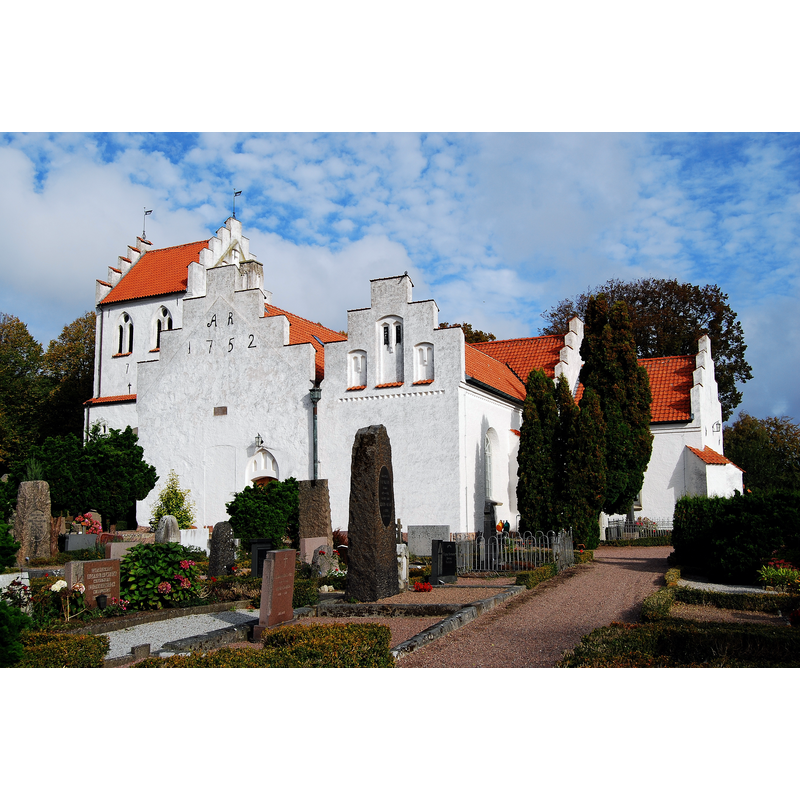 Source caption: "The church is from the 12th century and has 15th century murals."