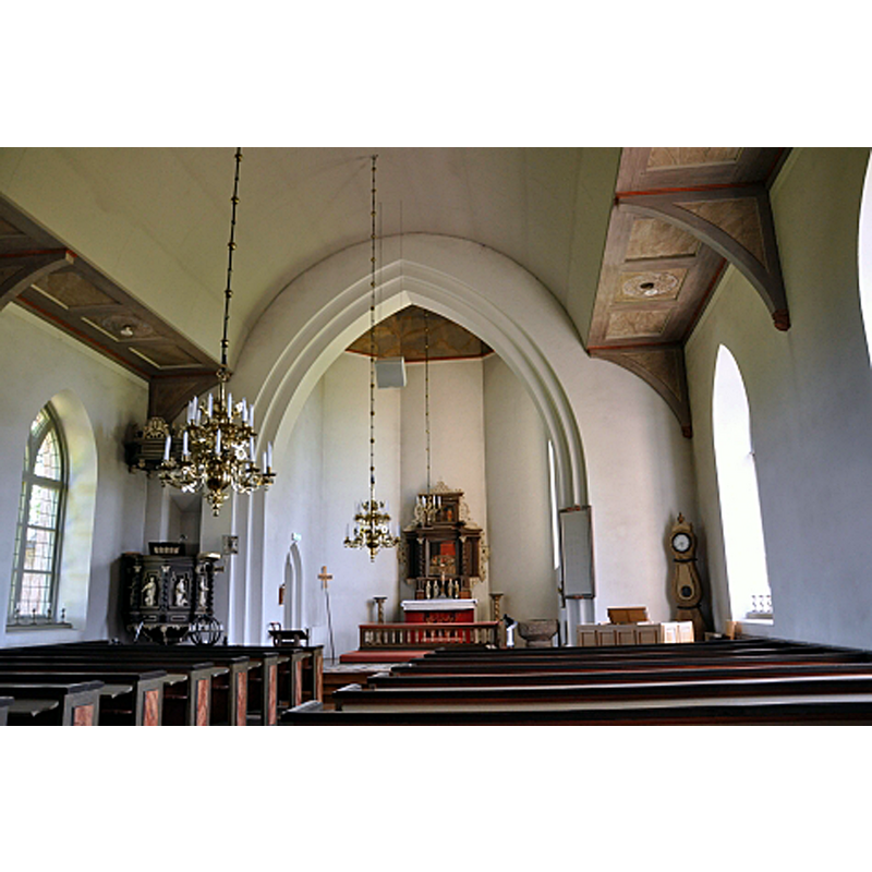 the interior of the 1893 church; the medieval font is visible at the far [east] end, by the right [south] pillar of the chancel arch