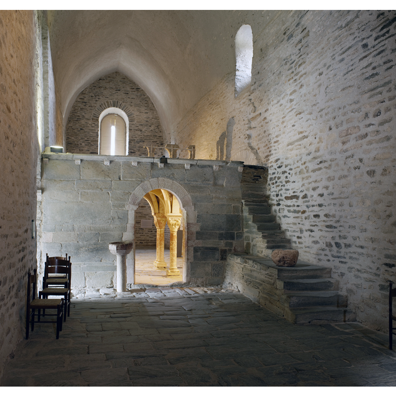 showing a holy-water stoup by the entranceway