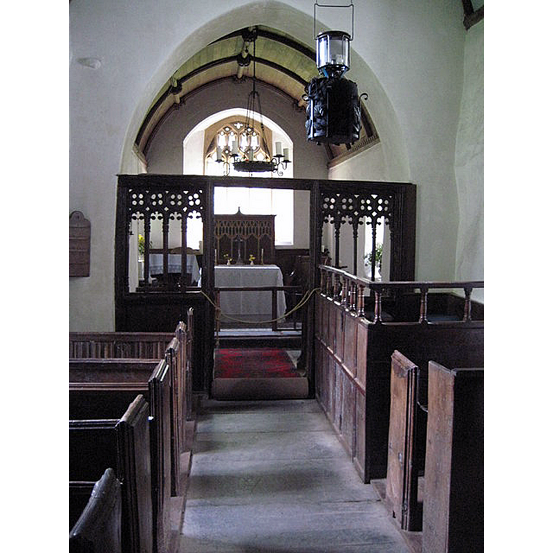 Source caption: "Interior of Culbone Church. View along the nave to the altar of Culbone church, England's smallest church."