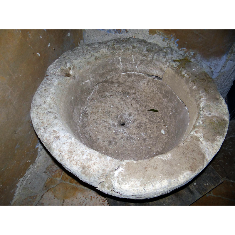 notice the drain hole; the metal staple in the upper rim, left side, is from an old cover