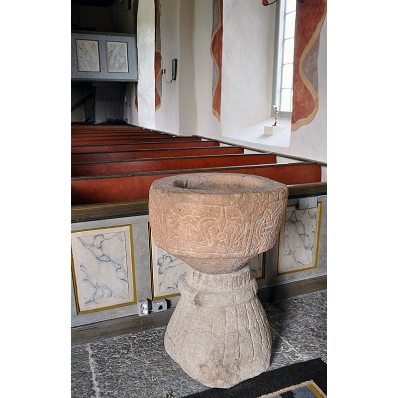 the font seen here totally detached, at the northeast end of the nave