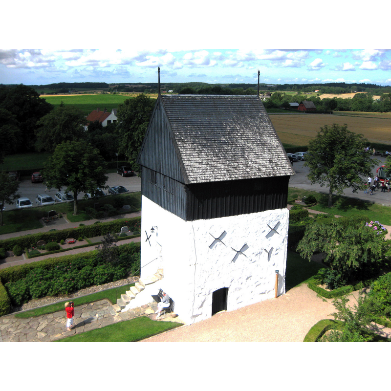 Source caption: "Klokketårnet ved Østerlars Kirke på Bornholm."