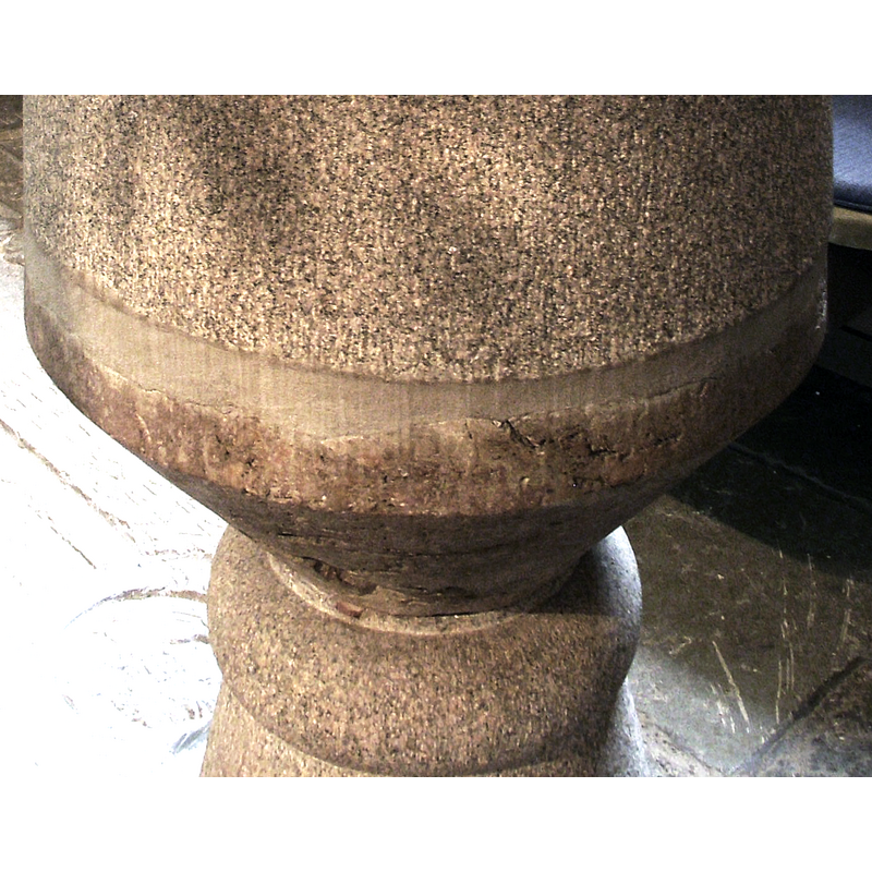 the underbowl fragment of the medieval font has been integrated in the reconstructed  font; the contour of the old fragment is discernible here