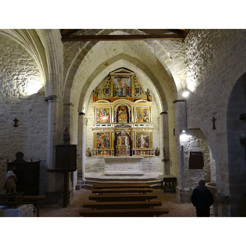the font is partially visible in the south chapel immediately to the right of the chancel arch