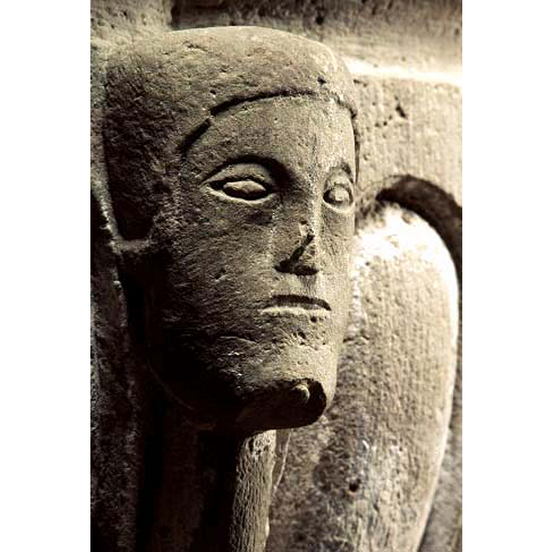 though not visible here there is a tonsure on his head