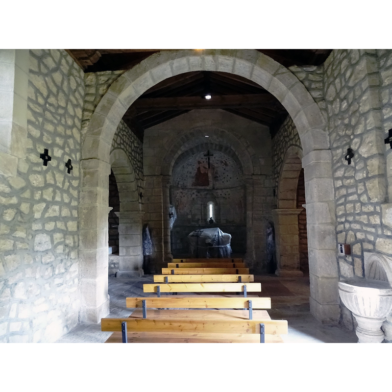 notice the late holy-water stoup by the south entranceway