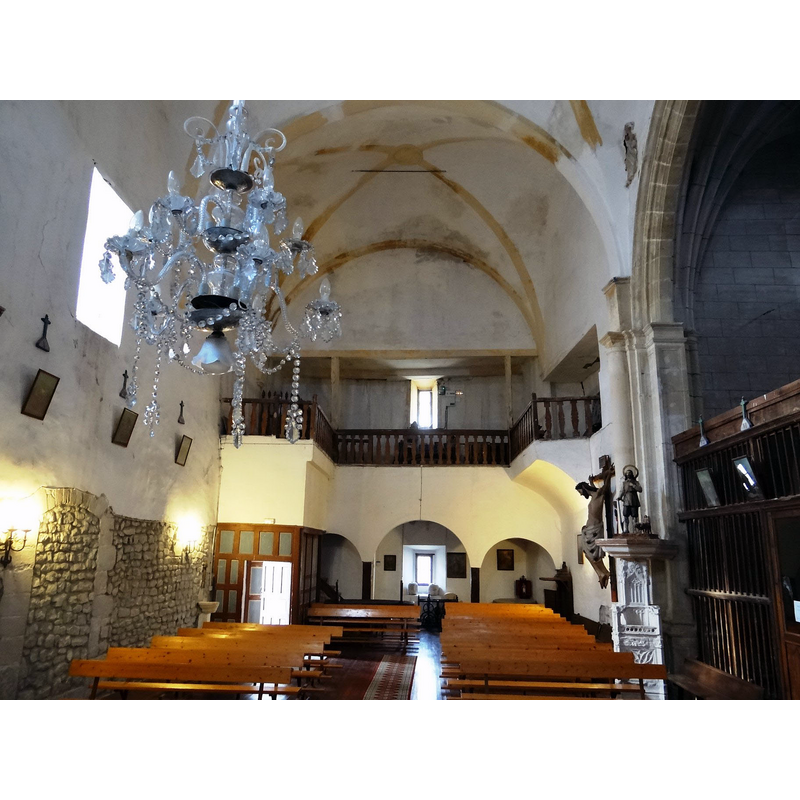 the top of the font and its plain cover are partially visible in the far [west] right [north] corner, beneath the gallery