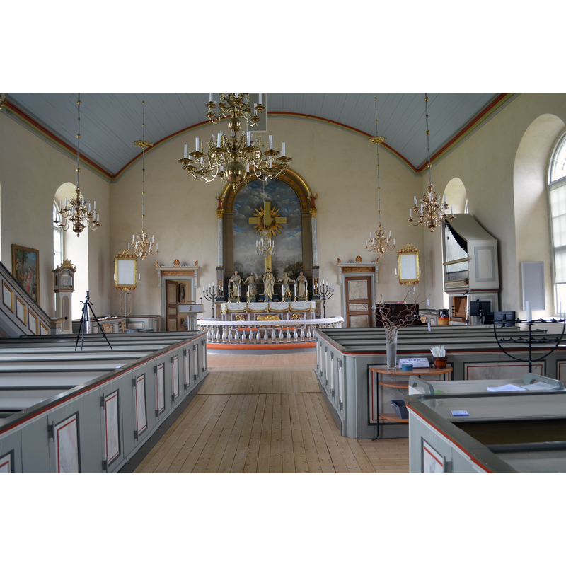 present church of 1847 is the fourth church on the site; the top of the medieval font originally from Skepplanda is partially visible in the northeast corner [pulpit side]