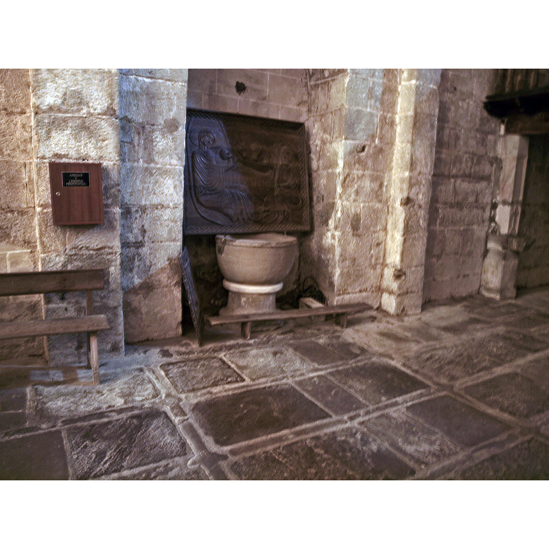 the font in the interior of the church