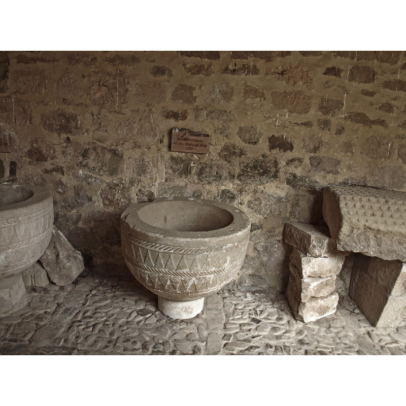 the font from Santa Maria de Hito as displayed in the cloister of San Martin de Elines in May 2013