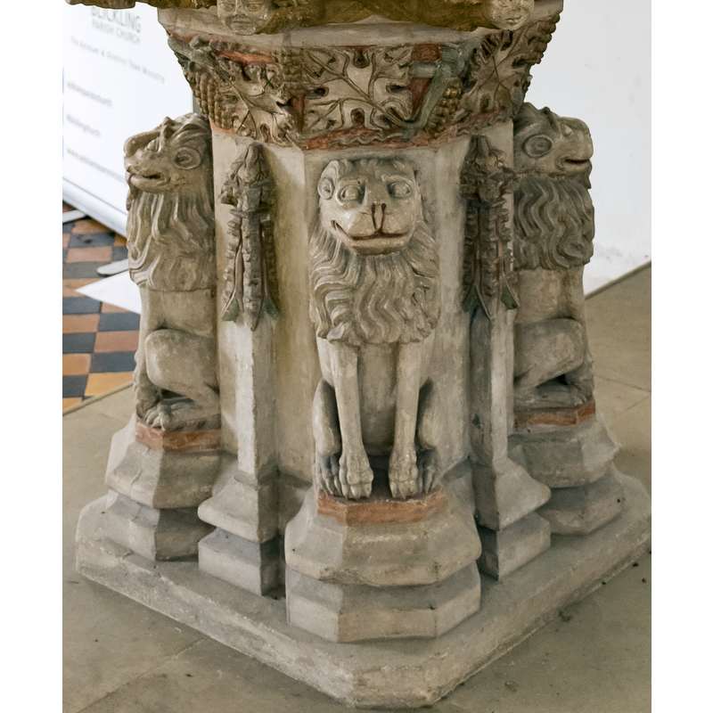on the sides of the base, alternating with crocketed buttreses