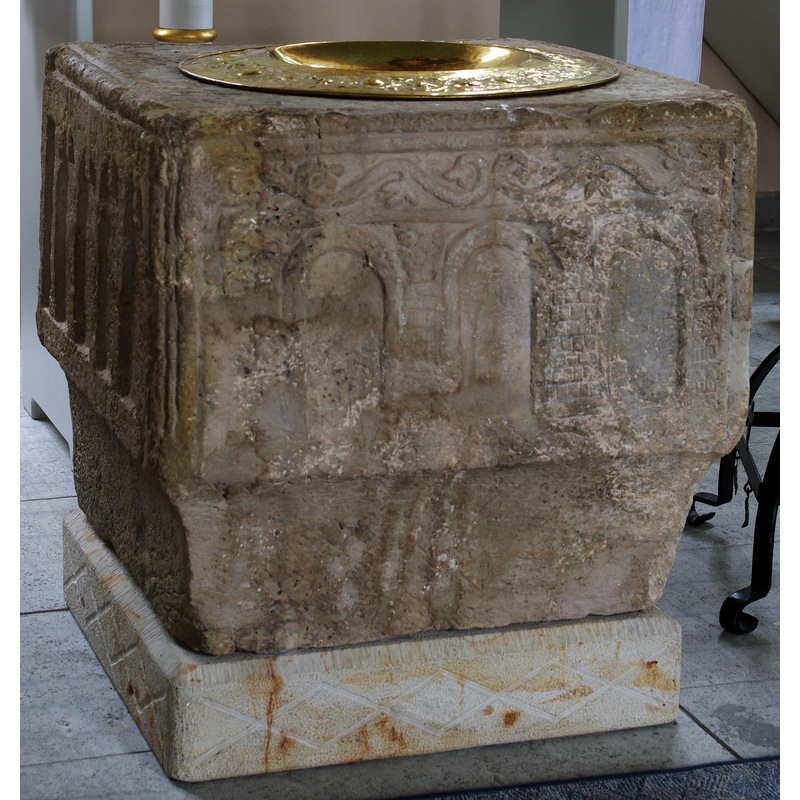 the font and its baptismal fish