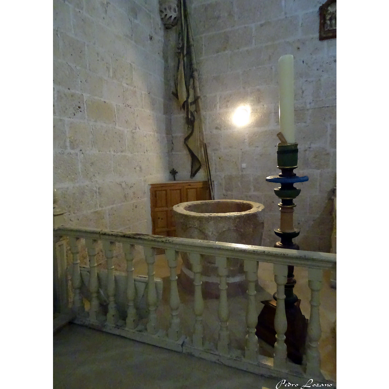 the cover is resting resting against the wooden railing in the left